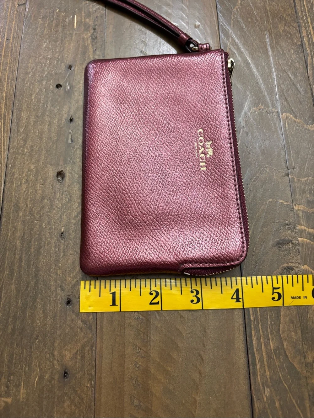 Coach Pebbled Leather Wristlet in Metallic Burgundy